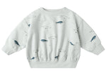 Cozy essential alert: The Quincy Mae Baby Boys' and Boys' Relaxed Fleece Sweatshirt features light gray fabric with playful blue and gray narwhals, perfect to keep kids comfy and stylish.