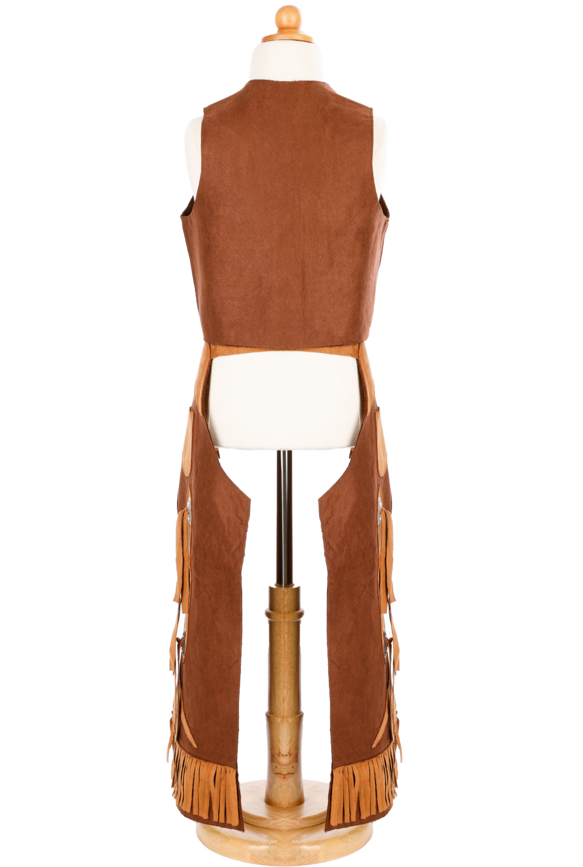 The Great Pretenders Cowboy Vest and Chaps, designed for ages 7-8, is elegantly showcased on a mannequin from the back view, featuring brown fringed leather and long decorative panels that evoke a rugged western charm.