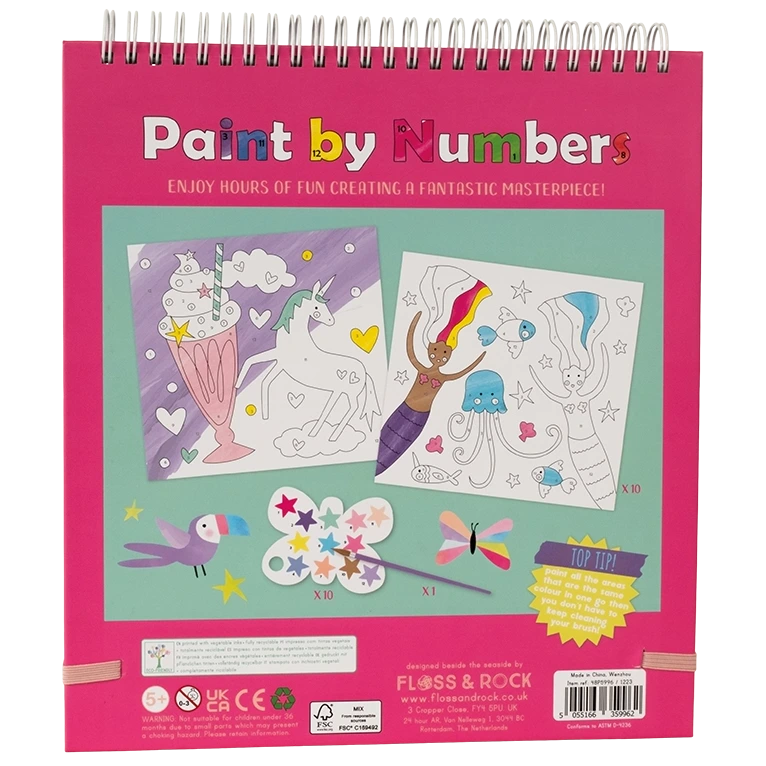The Floss and Rock Fantasy Paint By Numbers features a spiral-bound book with sample pages, including unicorn, milkshake, and rainbow designs, plus illustrated paint palette and brush—making it the perfect creative art kit or paint by numbers set for kids.