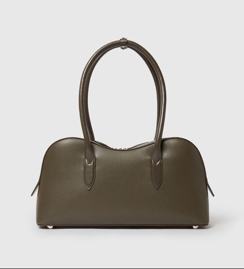 The Ryder Shoulder Bag by Stella McCartney is a vegan olive green bag with two handles, a rounded top, and minimal detailing, shown against a plain light grey background.