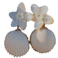 Introducing the Collected By Farrell La Mer Shell Earrings, an exceptional piece that showcases a floral top design with scalloped mother-of-pearl shells elegantly hanging below.