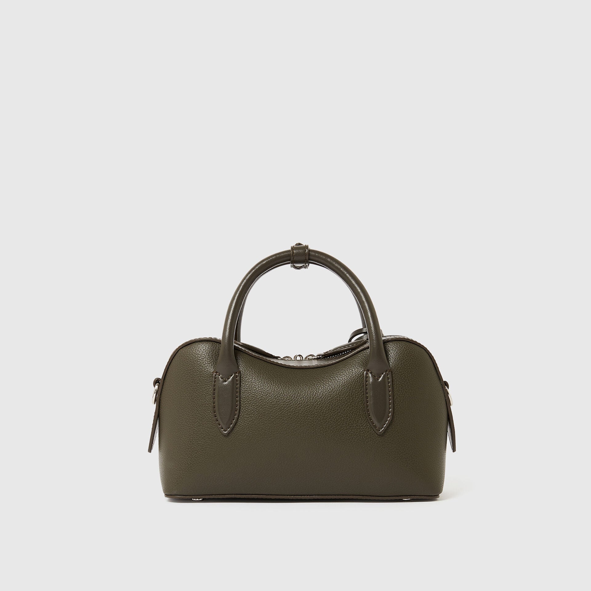 The Ryder Crossbody Bag by Stella McCartney is a small, structured olive green cruelty-free handbag with two handles and a zipper closure, shown against a plain light background.