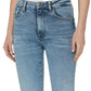 A person wearing Frame’s The Reboot light blue high-rise jeans and a white top, hands by their sides, highlights comfortable denim for an effortless look.