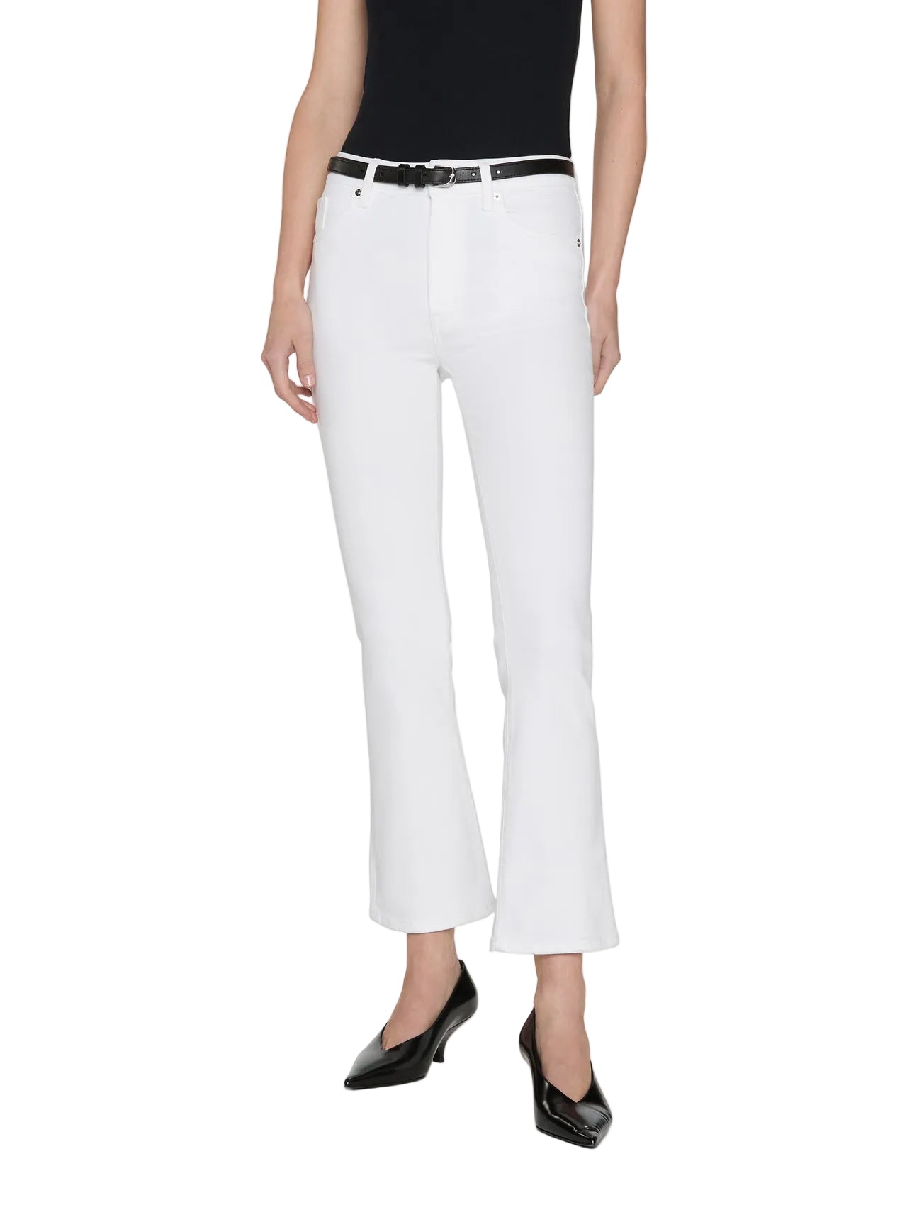 A person wearing a black sleeveless top, Frame's The Reboot Crop ultra-stretch denim bootcut jeans with a black belt, and black pointed-toe shoes, standing against a plain white background.