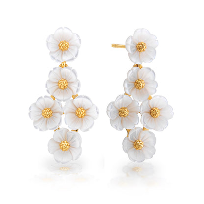 The Juliska Capucine De Wulf Mermaid Garden Floral Petite Post Drop Earrings feature delicate white floral clusters with gold centers in a vertical design—perfect statement earrings for any occasion.