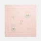 The Baby Knit Floral Blanket by Stella McCartney Kids is a light pink, square, lightweight blanket with embroidered pastel flowers in a simple center pattern.