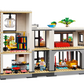 The LEGO® Creator Modern House by Legos - Toyhouse is a playset with four rooms: living area, bedroom, kitchen, and study. It includes light fixtures, bookshelves, plants, and two figures to inspire imaginative play.