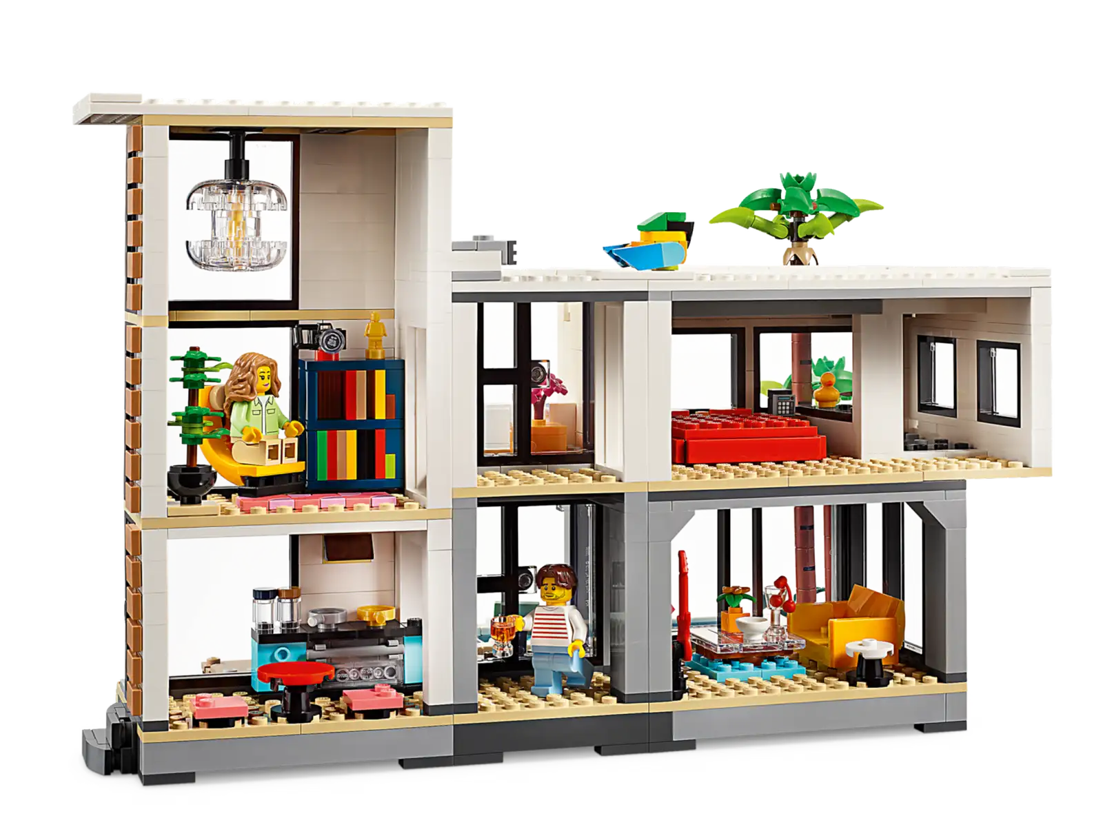 The LEGO® Creator Modern House by Legos - Toyhouse is a playset with four rooms: living area, bedroom, kitchen, and study. It includes light fixtures, bookshelves, plants, and two figures to inspire imaginative play.