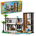 Legos - Toyhouse's LEGO® Creator Modern House set is a versatile playset featuring a built model in the foreground with its box in the background, ideal for kids who love creative play with modern house themes.