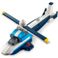 The Legos - Toyhouse LEGO® Creator 3-in-1 Creator Aircraft: Race Plane features a blue, white, and yellow plane model with spinning rotors, cockpit, and detailed tail, displayed on a plain white background.