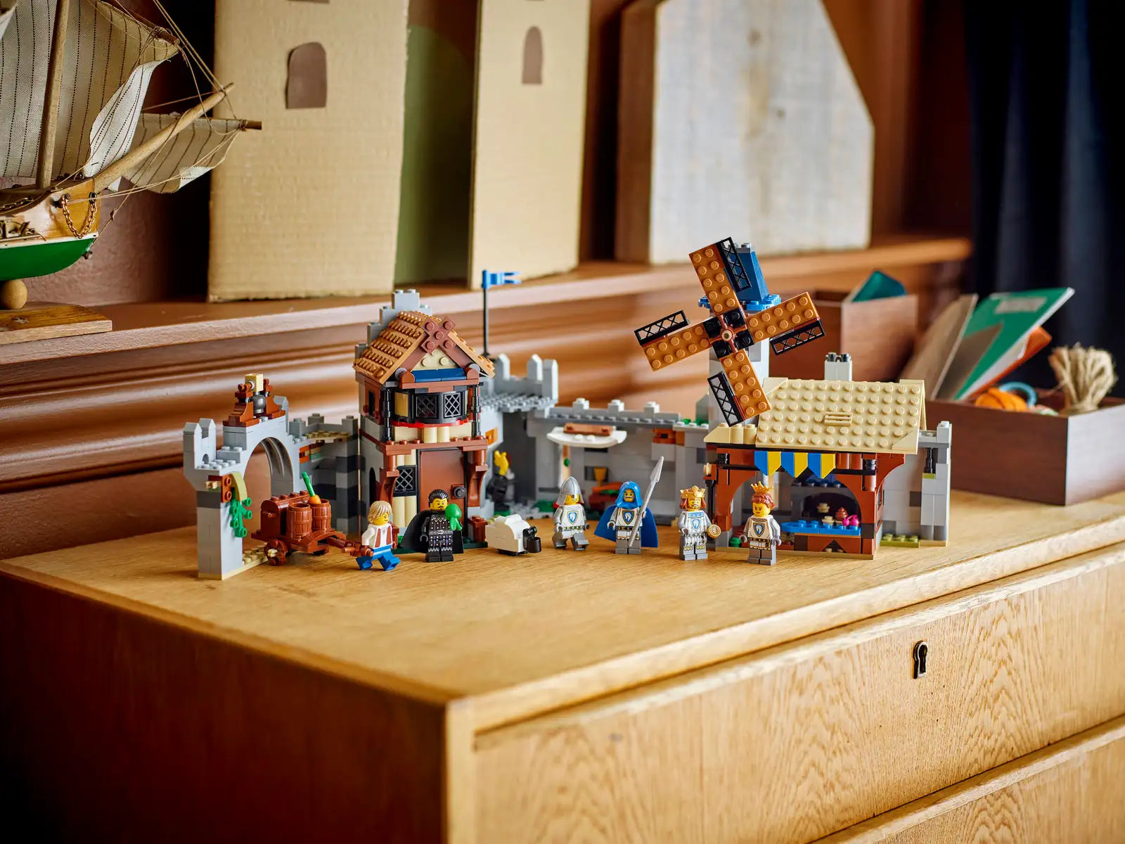 The LEGO® Creator™ 3-in-1 Medieval Horse Knight Castle by Legos - Toyhouse features a castle, windmill, houses, and minifigures—perfect for medieval playset fans and a great addition to any collection.