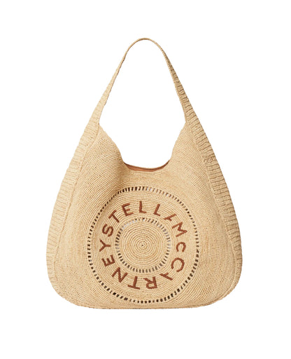 The Logo Raffia Slouchy Large Tote Bag by Stella McCartney features beige woven raffia, a circular logo on the front, and a wide shoulder strap. This vegan tote combines signature style with sustainable design.