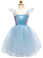 The Great Pretenders Sequins Princess Dress is a child-size blue dress featuring a sparkling sequined bodice, tulle skirt, and ruffled shoulder straps, displayed on a mannequin — perfect as a girls’ party dress for any special occasion.