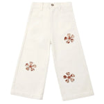 Rylee & Cru’s Girls’ Straight Leg Pant features a crisp white design with two large floral appliqués on one leg and a third on the other, each bloom showcasing five brown and pink patterned petals, plus an embroidered pocket adds an extra special detail.