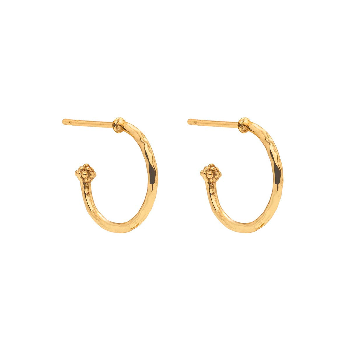 The Juliska Capucine De Wulf Mermaid Garden Hoop Earrings feature small golden hoops with a textured finish and post backs, each adorned with a delicate flower charm for subtle elegance.