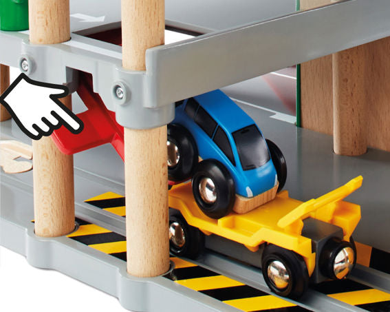 Brio World car loading onto a car troller from a down ramp.