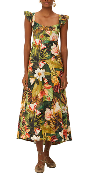 A woman wears the Farm Rio Botanical Forest Multicolor Scoop Neck Ruffled Strap Dress with a vibrant botanical print and brown flat shoes.