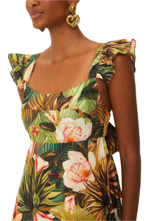 Woman wearing a Farm Rio Botanical Forest Multicolor Scoop Neck Ruffled Strap Dress with gold heart-shaped earrings.