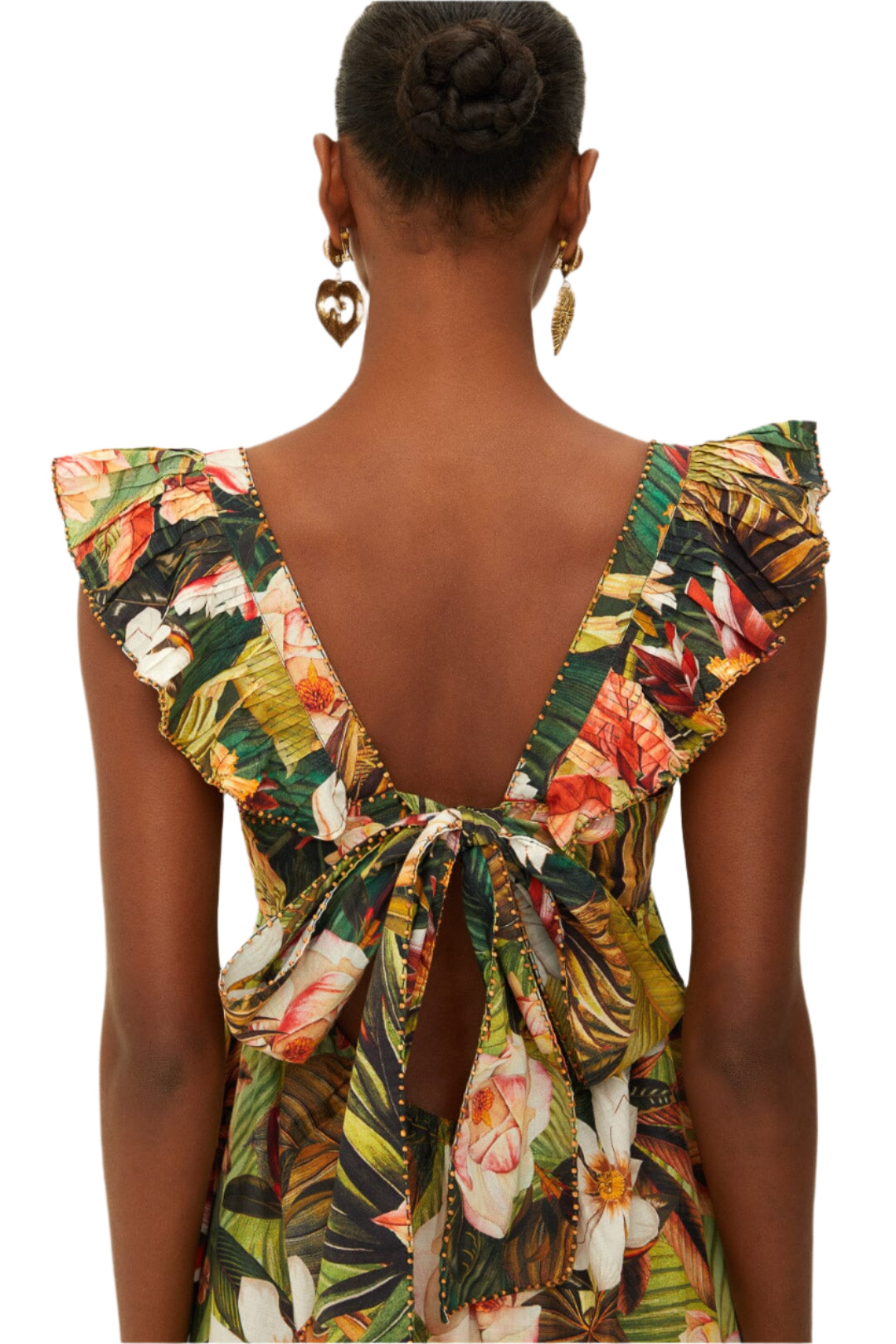 A woman with a bun and heart-shaped earrings is seen from behind wearing the Farm Rio Botanical Forest Multicolor Scoop Neck Ruffled Strap Dress.
