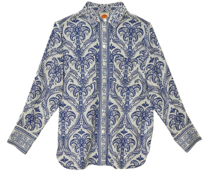 The Blue Tropical Cameo Off-White Pajama Shirt by Farm Rio features blue and white paisley and floral prints, crafted from LENZING™ ECOVERO™ eco-responsible fibers, shown flat on a white background.