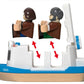 A BRIO World toy boat with two figures.