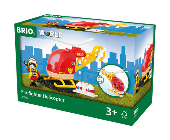 Box labeled "Brio World" showcasing a Brio World Firefighter Helicopter set for children aged 3 and up. The set includes a red helicopter, a firefighter figure acting as the pilot, and accessories vital for ensuring an effective water supply.