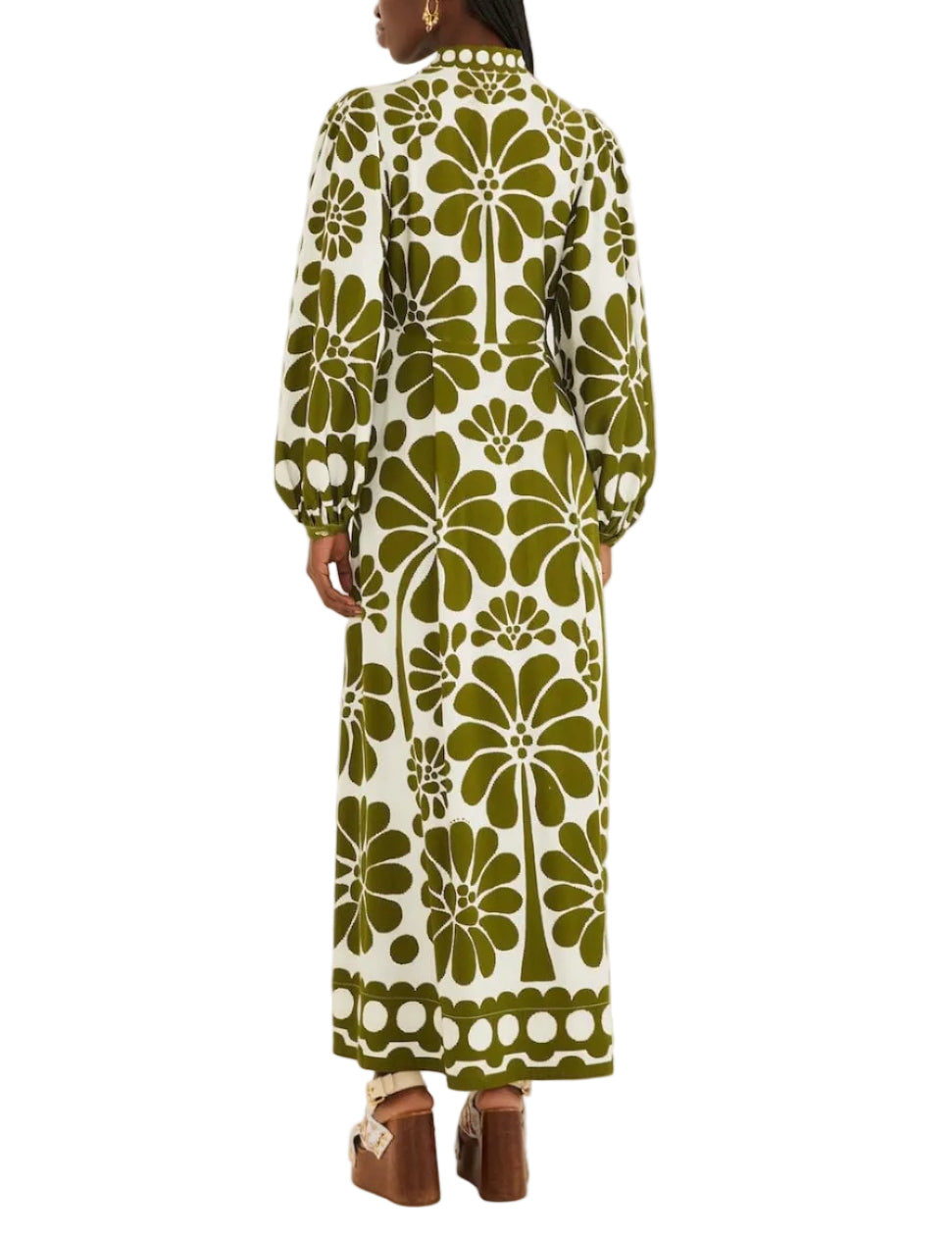 A woman is seen from the back wearing the Farm Rio Palermo Green Maxi Dress, which features buttoned puff sleeves and a green and white floral pattern, styled with platform sandals.