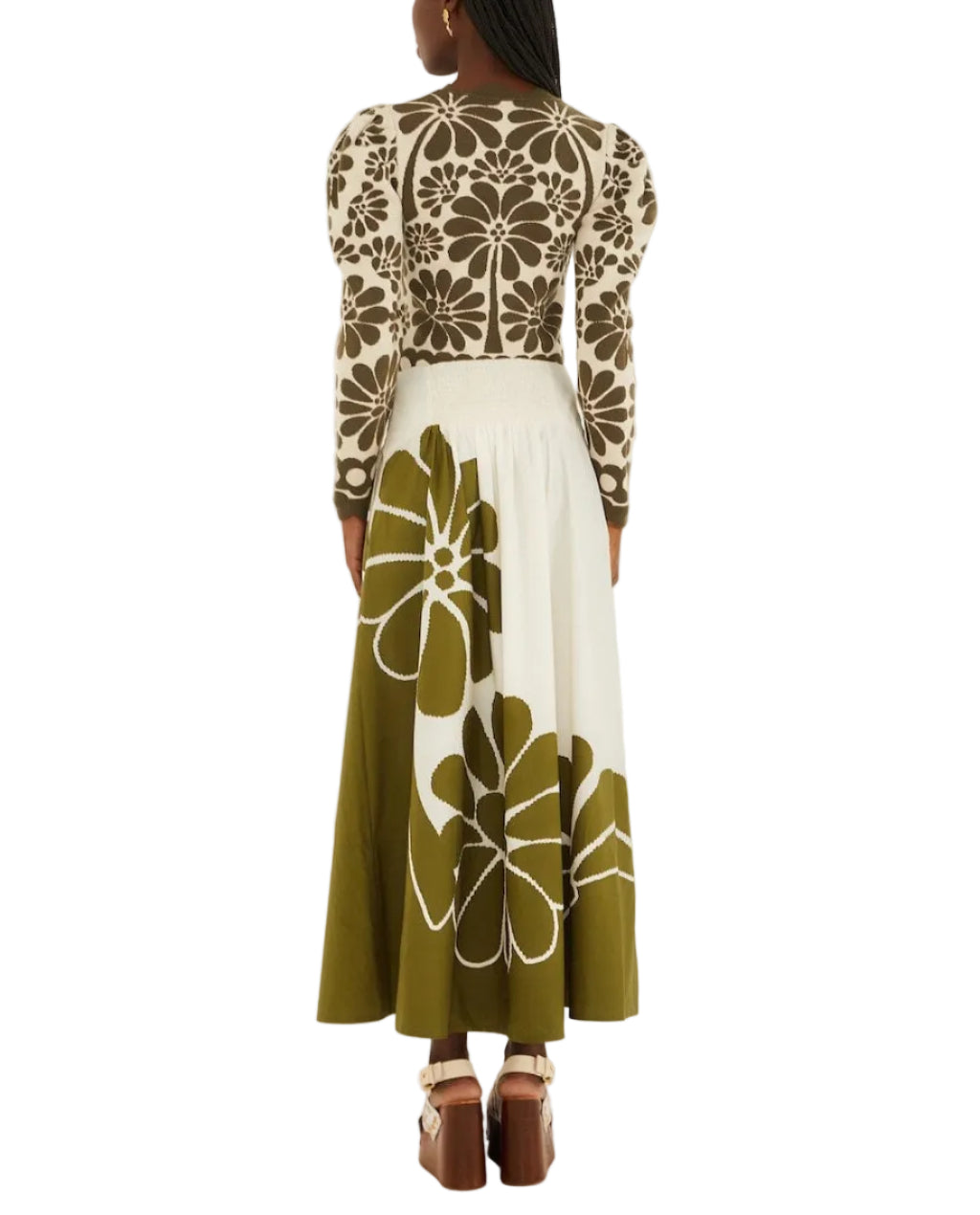 A woman is seen from the back in a long-sleeve brown and white floral top paired with a Farm Rio Palermo Green Midi Skirt, made from organic cotton, featuring olive green and white tones.