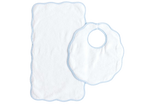 The Terry Tots Bib & Burp Set, featuring a white rectangular burp cloth and a round bib with blue scalloped edges, is displayed on a plain background—perfect essentials for those special feeding moments.