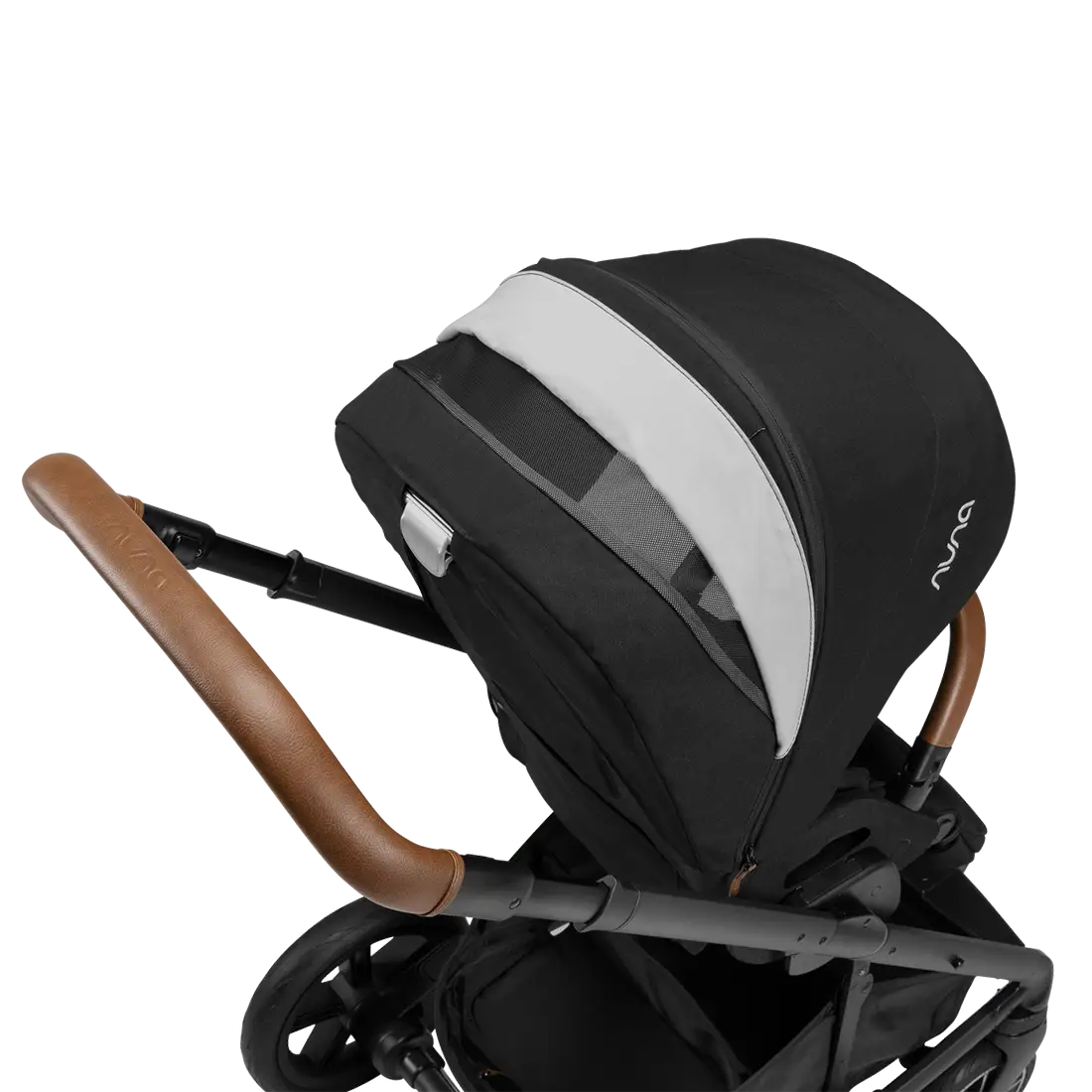 The Nuna MIXX Next Stroller by Nuna showcases a stylish black and white design paired with a brown leather handle, along with its compact fold feature for convenient storage.