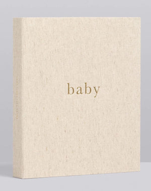 A simple beige Write To Me Baby Birth to Five Years Oatmeal journal cover with the word "baby" printed in lowercase letters.