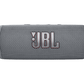 The JBL Flip 6 Waterproof Bluetooth Speaker features a prominent logo on its gray mesh texture, delivering powerful sound for portable use.
