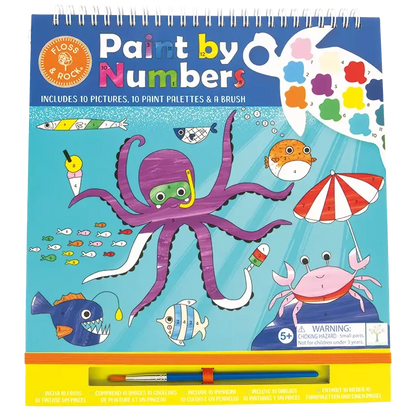The Paint By Numbers – Ocean kit by Floss and Rock features illustrated sea creatures like an octopus, fish, and crab on the cover, with paint palettes displayed at the top right—a perfect art kit for kids to enjoy hours of creative fun.