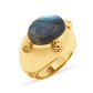 The Cleopatra Oval Ring by Juliska Capucine De Wulf features a blue labradorite gemstone and gold bead accents, engraved with "CDR" inside—the perfect blend of elegance and intrigue.