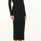 A woman styles a long-sleeved, button-down black midi dress with an off-the-shoulder neckline and Staud Brigitte Satin Mules—open-toe kitten heels ideal for versatile dressing.