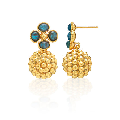 The Juliska Capucine De Wulf Berry Clover Drop Earrings feature a four-stone blue floral design with gold berry clusters—an elegant choice to complement any cocktail dress.