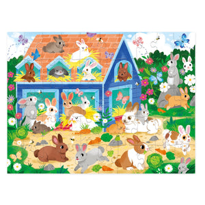 Explore the colorful Crocodile Creek Bunny House 50 Piece Puzzle, a captivating educational illustration featuring rabbits playing around a blue house. Complete with flowers, grass, and butterflies in a garden setting, this puzzle not only enriches hand-eye coordination but also fascinates young minds.