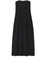 The CO Strapless Dress features a fitted bodice and slightly flared, knee-length black skirt—an elegant choice for formal events.