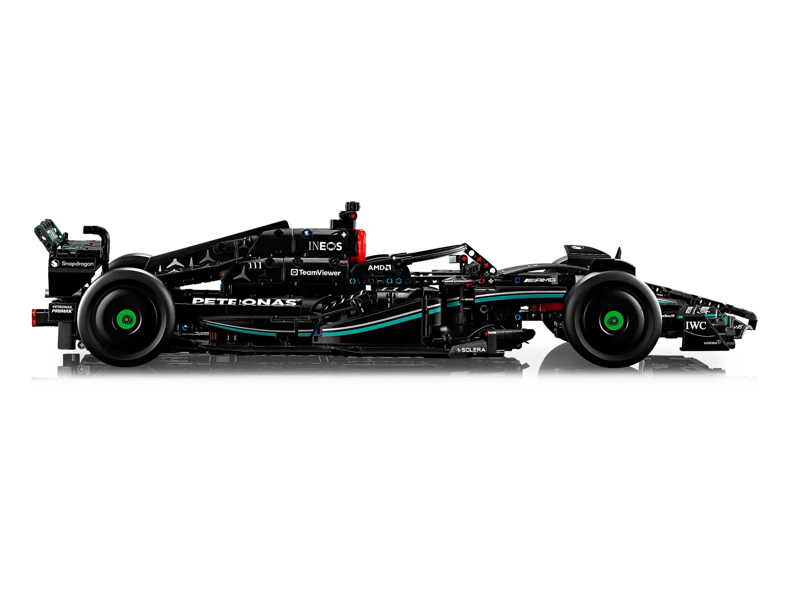 Side view of the black LEGO Mercedes-AMG F1 W14 E Performance, from Legos - Toyhouse, adorned with green and white accents and sponsor logos—a superb choice for fans wanting a LEGO Technic model car building set.