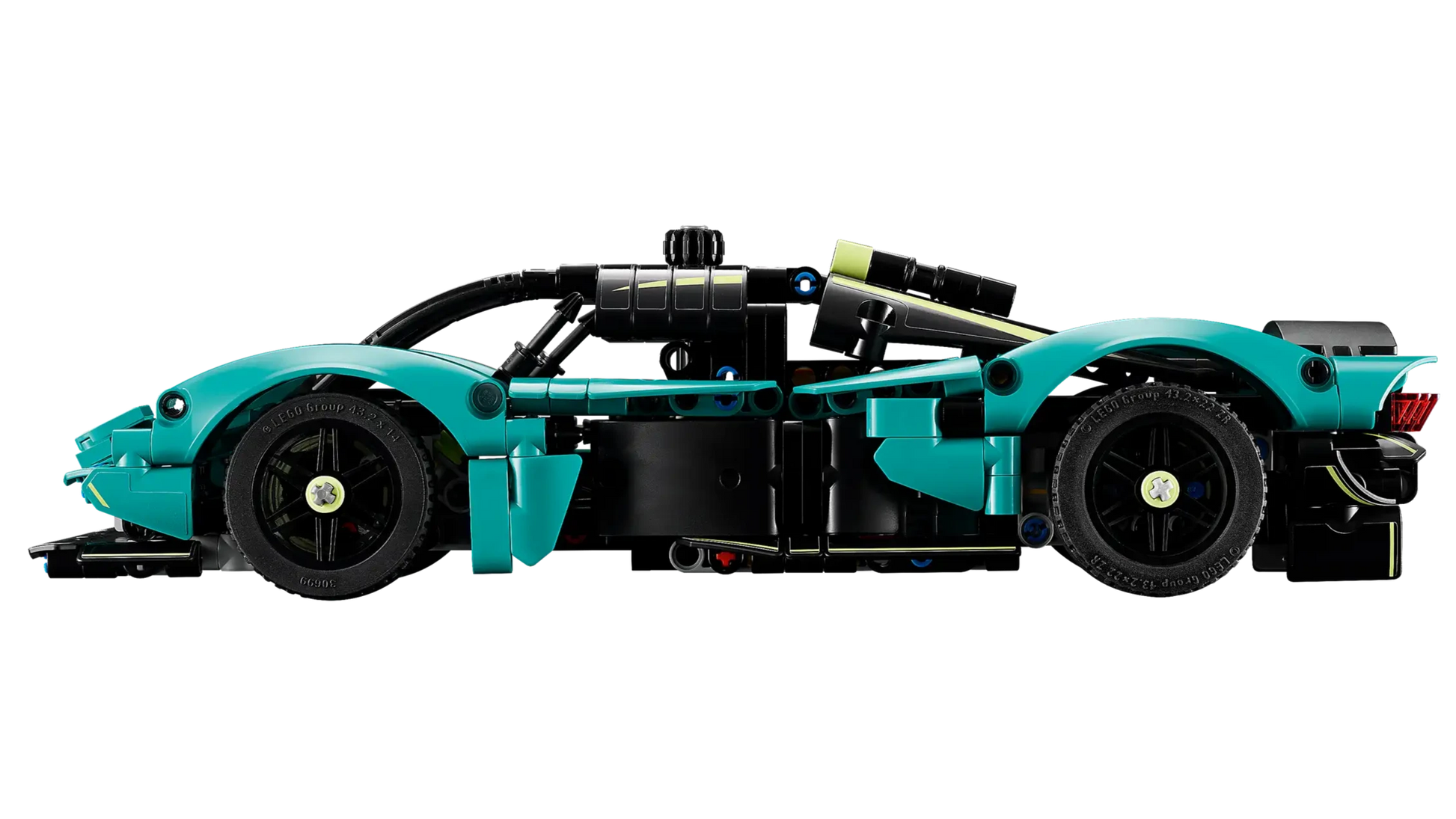 Side view of a teal and black LEGO® Technic™ Aston Martin Valkyrie by Legos - Toyhouse, featuring visible wheels, detailed cockpit, aerodynamic design, and an impressive V12 engine.