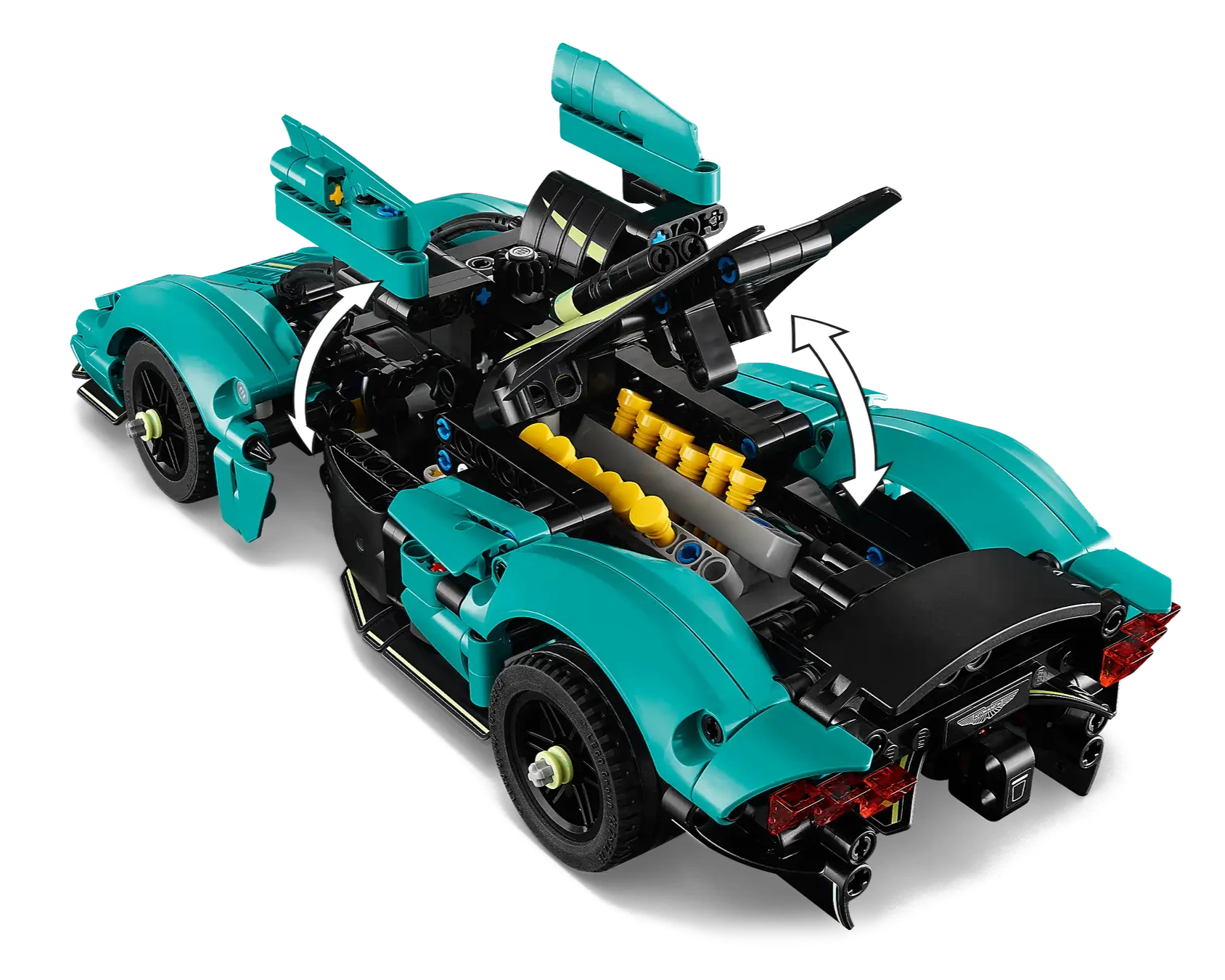 The LEGO® Technic™ Aston Martin Valkyrie by Legos - Toyhouse features teal and black panels, opening to reveal interior details, moving components, and yellow V12 engine cylinders.