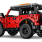 A LEGO® Technic™ Ford Bronco® SUV by Legos - Toyhouse, featuring a red off-road design with a rear spare tire and exposed building parts, shown against a white background.