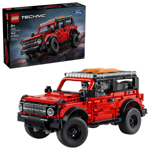 A LEGO® Technic™ Ford Bronco® SUV from Legos - Toyhouse is shown built in red below its box, featuring the same off-road vehicle—an ideal STEM building toy for aspiring young engineers.