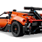 The LEGO® Technic™ Bugatti Chiron Pur Sport Hypercar by Legos - Toyhouse is shown from the rear left, highlighting its detailed spoiler, tires, and exhaust—an impressive building set for car racing toy enthusiasts.