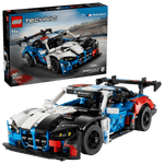 The LEGO® Technic™ BMW M4 GT3 EVO Race Car by Legos - Toyhouse is built in front of its box showing the same car and set details—ideal for fans who enjoy STEM building toys.