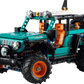 The LEGO® Technic™ Jeep® Wrangler Rubicon SUV by Legos - Toyhouse features teal and orange parts, large off-road tires, and working front and roof lights—ideal for engineering toy enthusiasts.