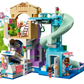 The LEGO® Friends Heartlake City Water Park by Legos - Toyhouse features a slide, various rooms, four mini-figures, a spiral slide, and a transparent green tunnel—perfect for kids’ imaginative water park role-play.