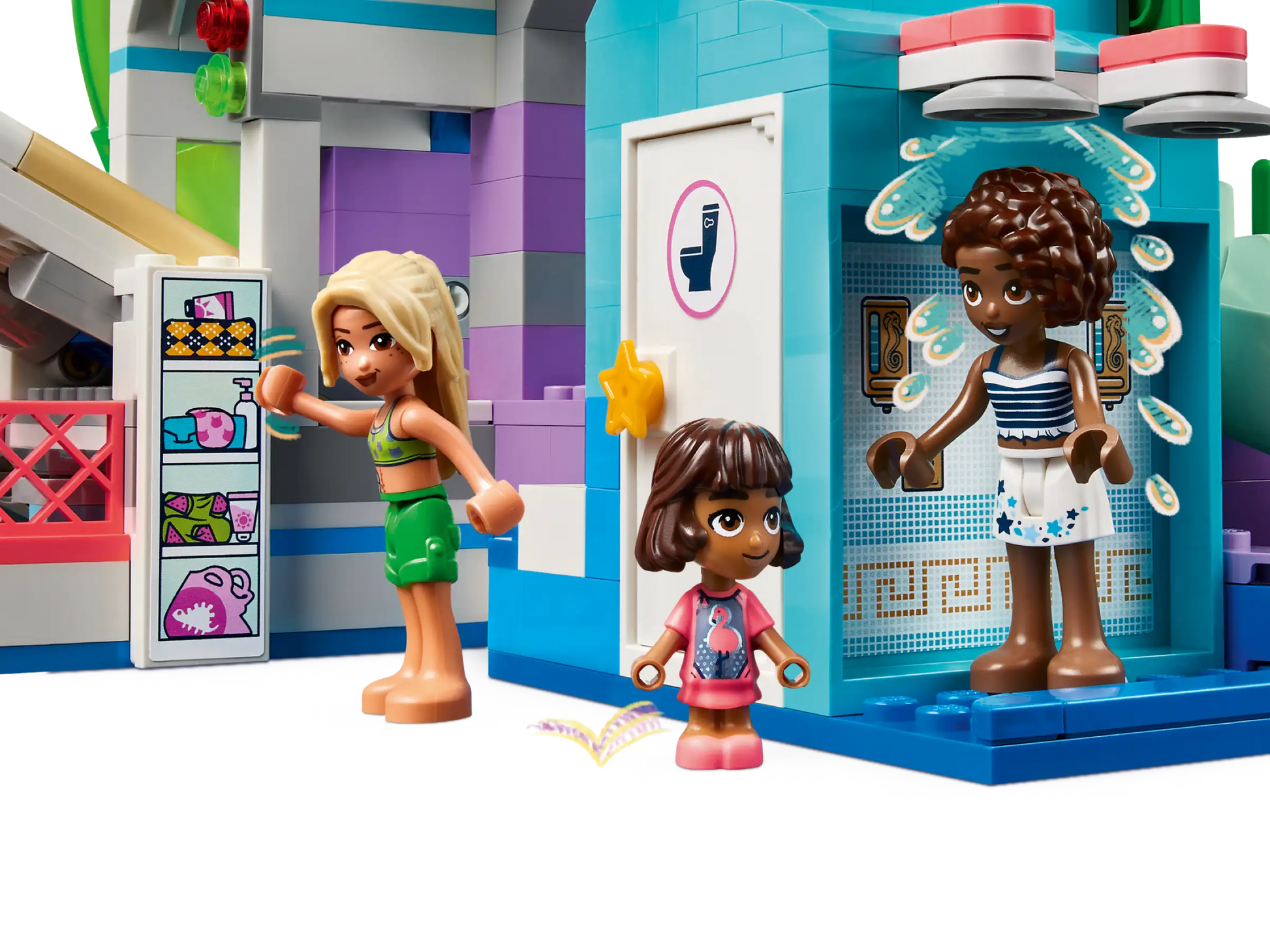 The LEGO® Friends Heartlake City Water Park by Legos - Toyhouse includes three mini-figures enjoying a vibrant playset with a shower and locker—great for kids who love creative role-playing fun.