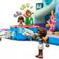 Four mini-dolls enjoy the LEGO® Friends Heartlake City Water Park by Legos - Toyhouse, with two using water blasters and two on a raised platform surrounded by colorful blocks—perfect for imaginative play adventures.