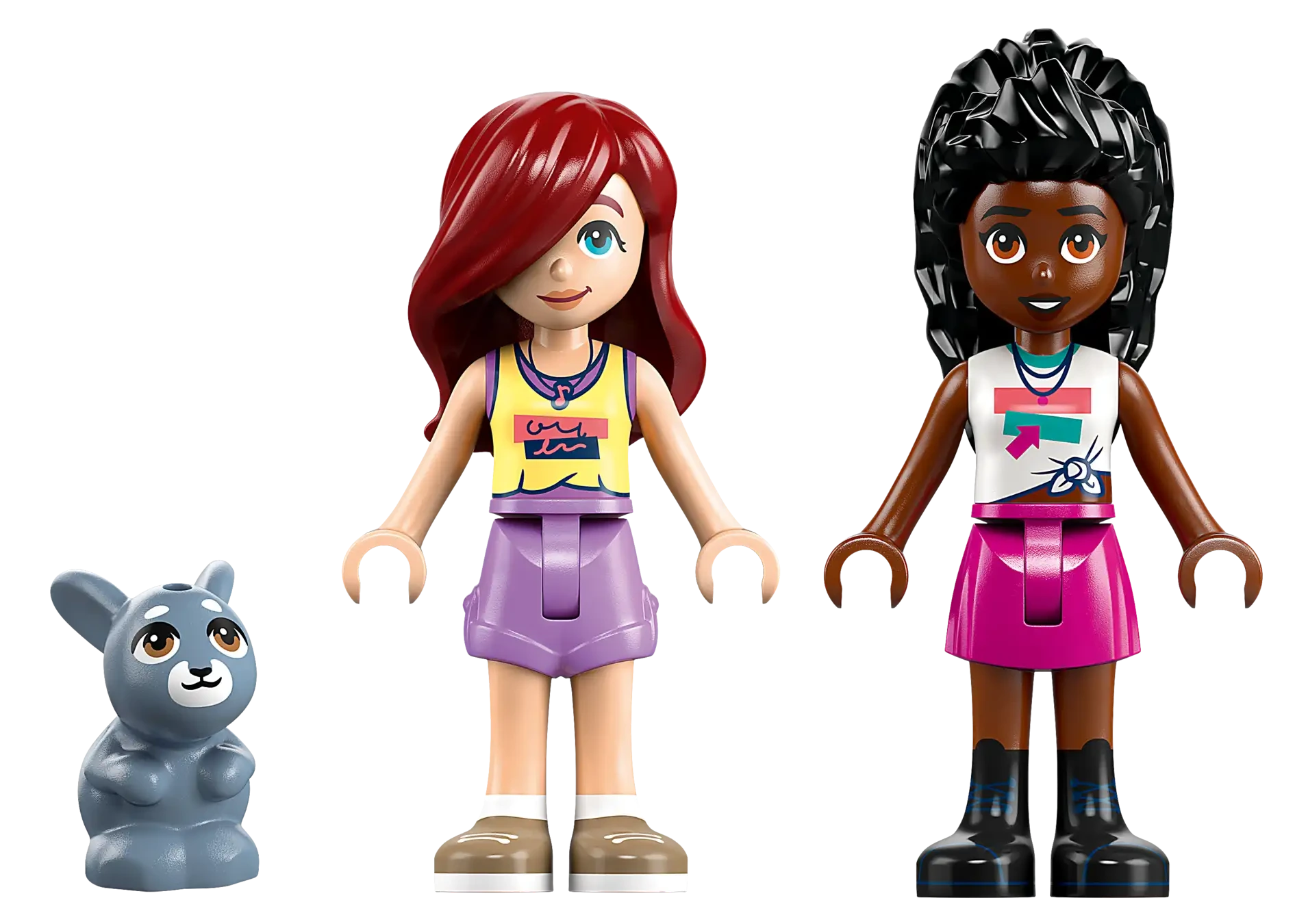 Two LEGO Friends mini-dolls with different looks and outfits stand together with a small gray animal, ready for fun. Enjoy imaginative adventures with the Legos - Toyhouse LEGO® Friends Heartlake City Ice Cream Truck set!.